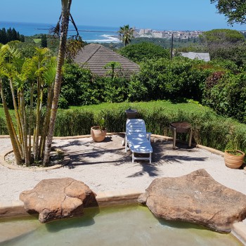 Pool Area View of Beach Entry pool + lounger